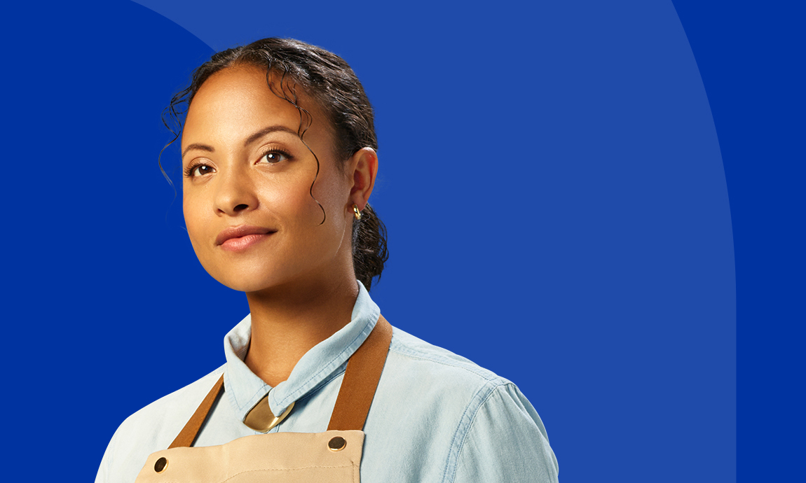 Blue banner with hypothetical bio-failed, crohn's disease patient Morgan smiling while wearing a brown apron
